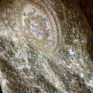 Cream beaded strapless gown, crisscross back